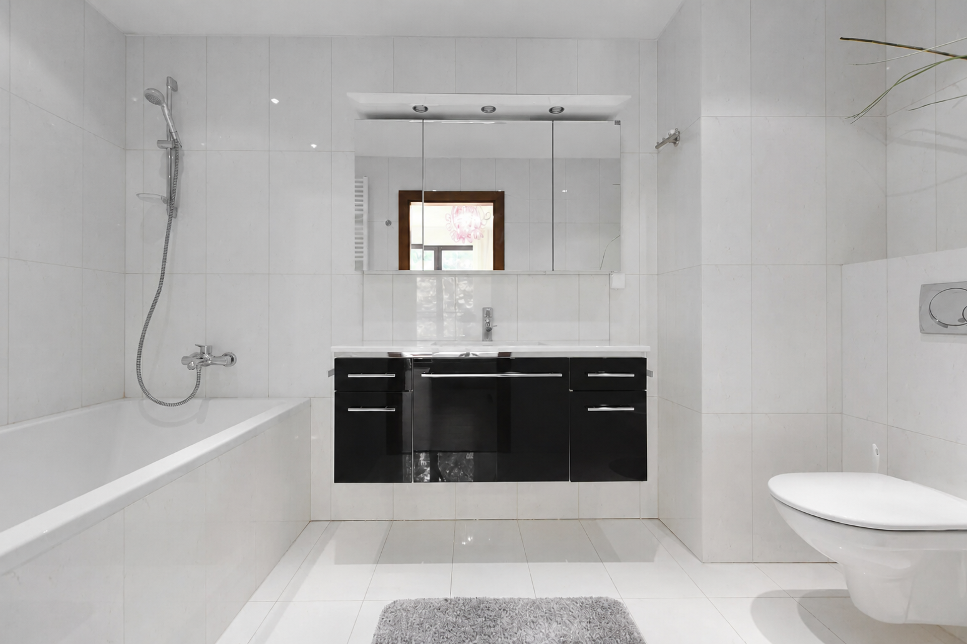 Modern bathroom with tub and vanity