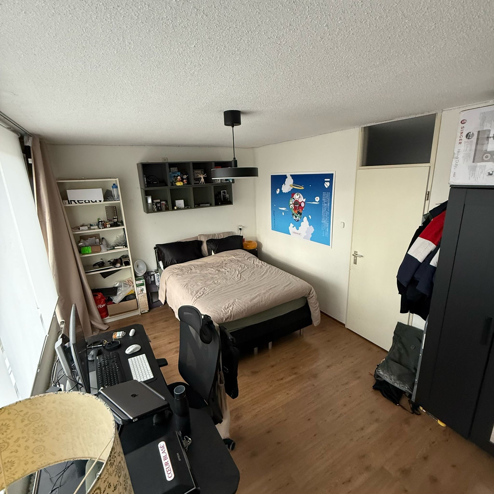 Bedroom with desk and wardrobe