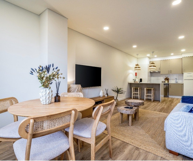 Open living, dining and kitchen area