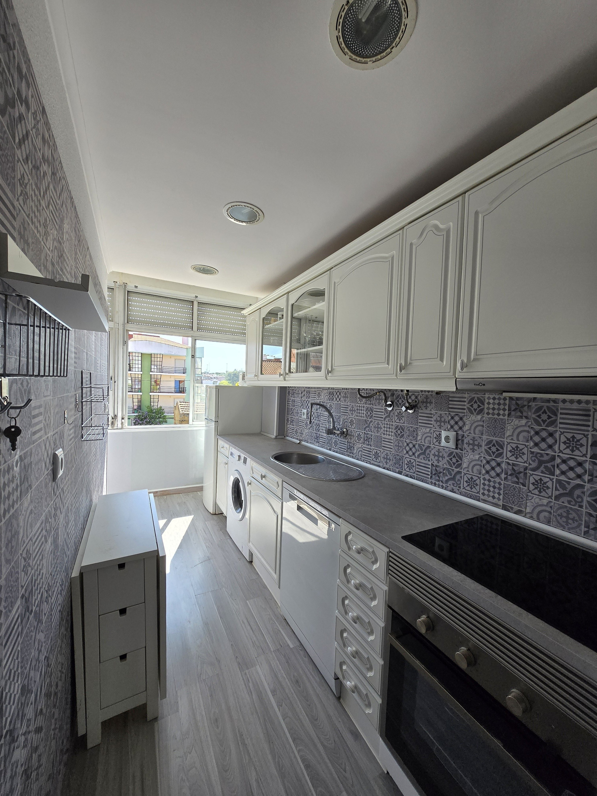 Bright kitchen with balcony access