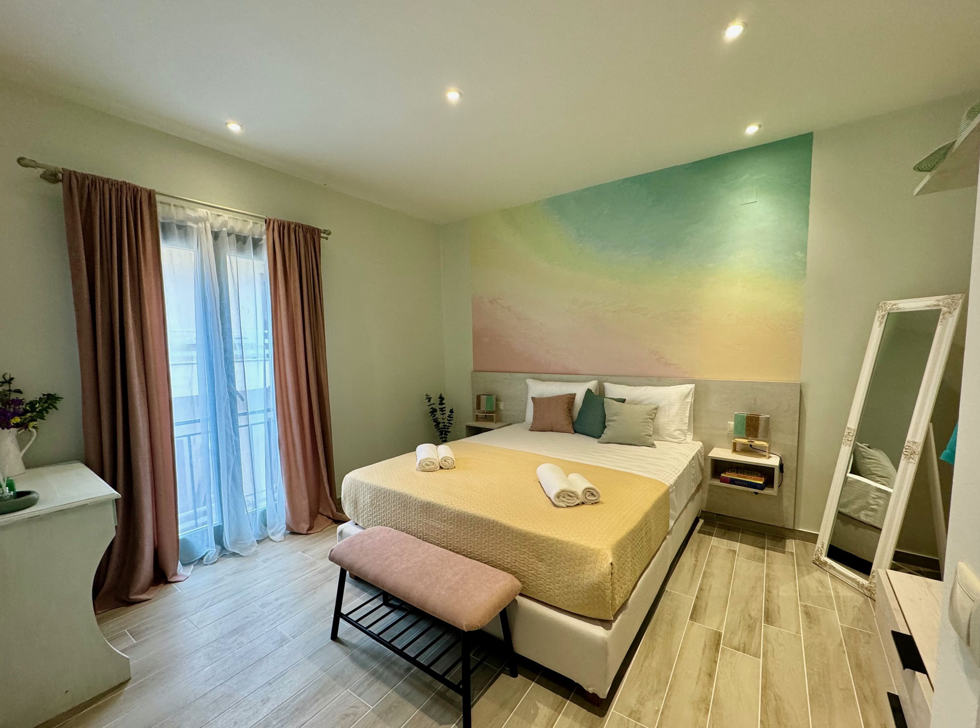 Bright bedroom with colorful accent wall