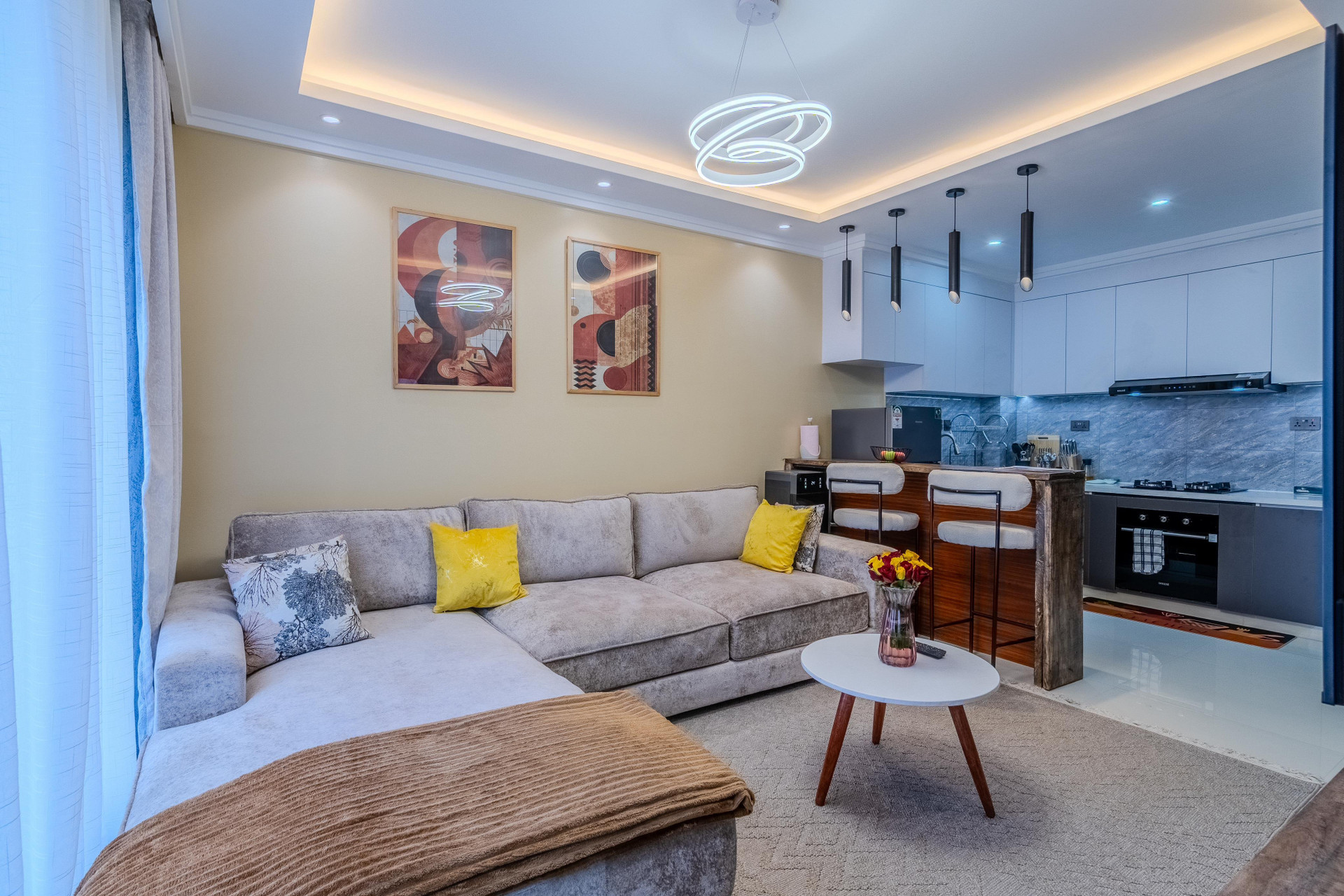 Bright, comfortable living room ideal for relaxing and working during long stays.
