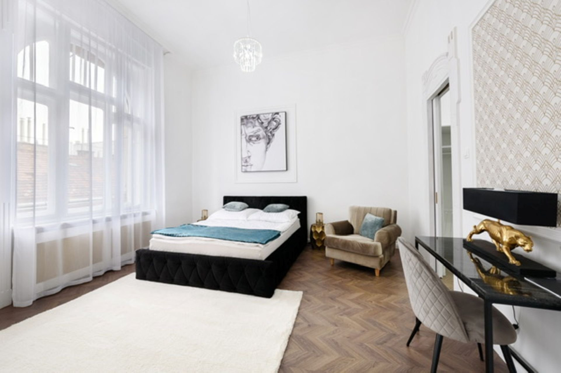 Bright bedroom with large windows