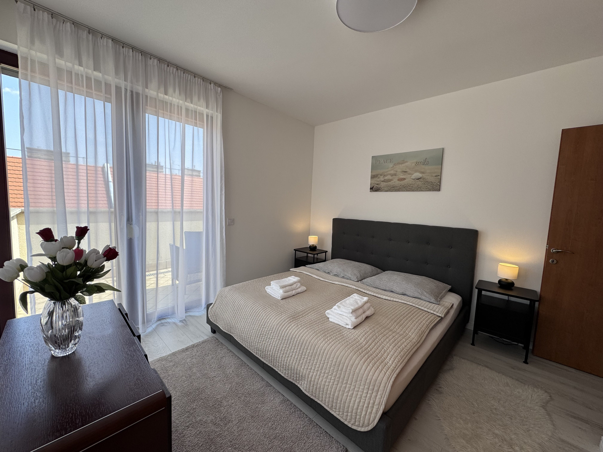 Master bedroom with balcony access