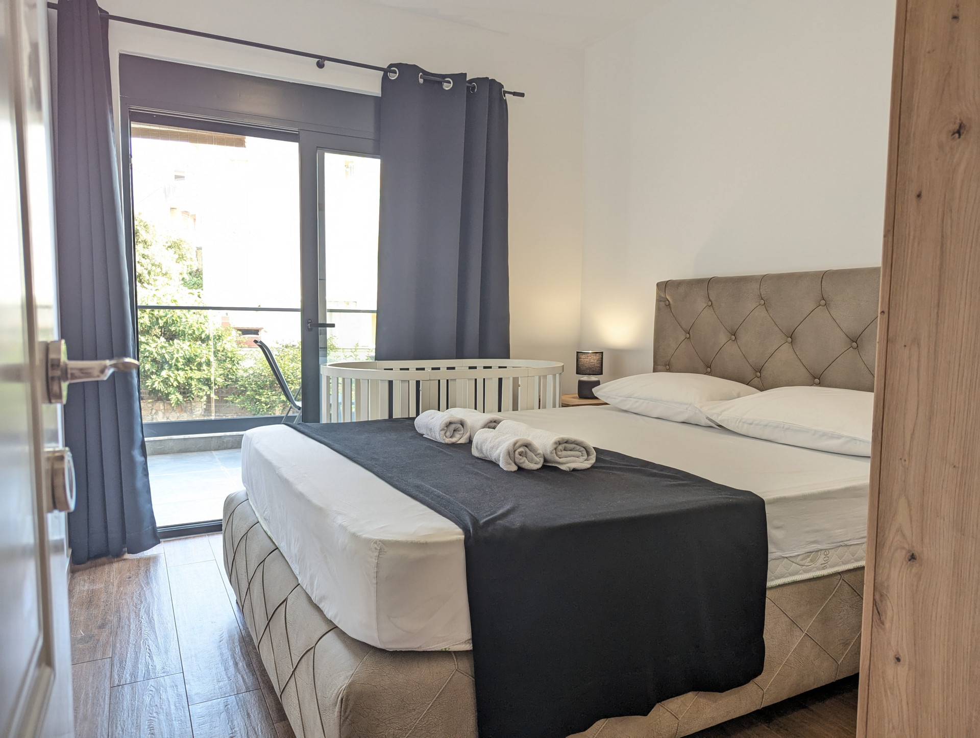 Cozy bedroom with balcony access