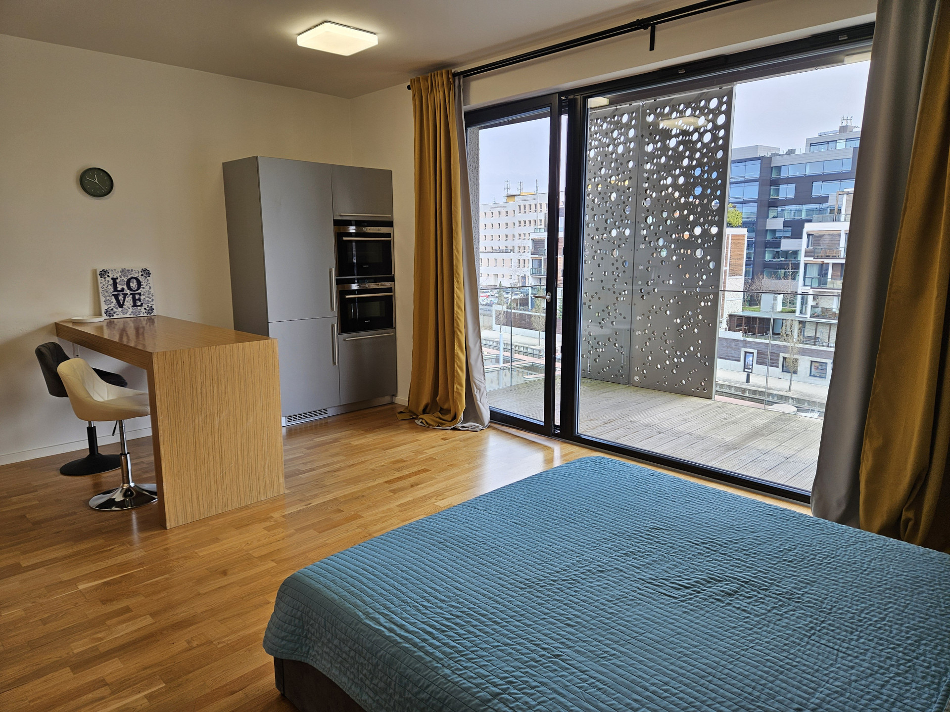 Studio room with large balcony doors
