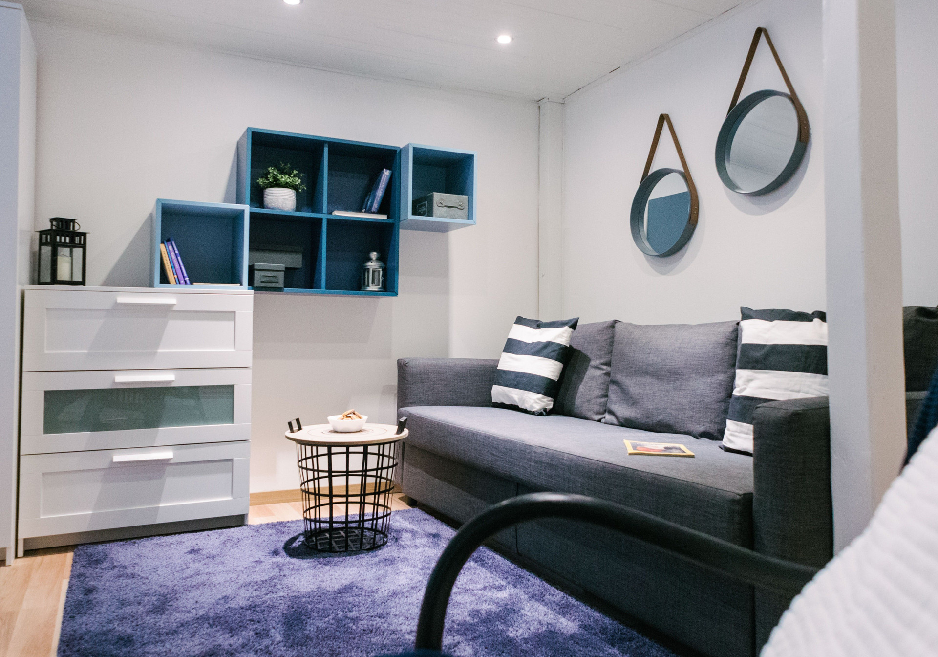 Living room sofa and blue shelves