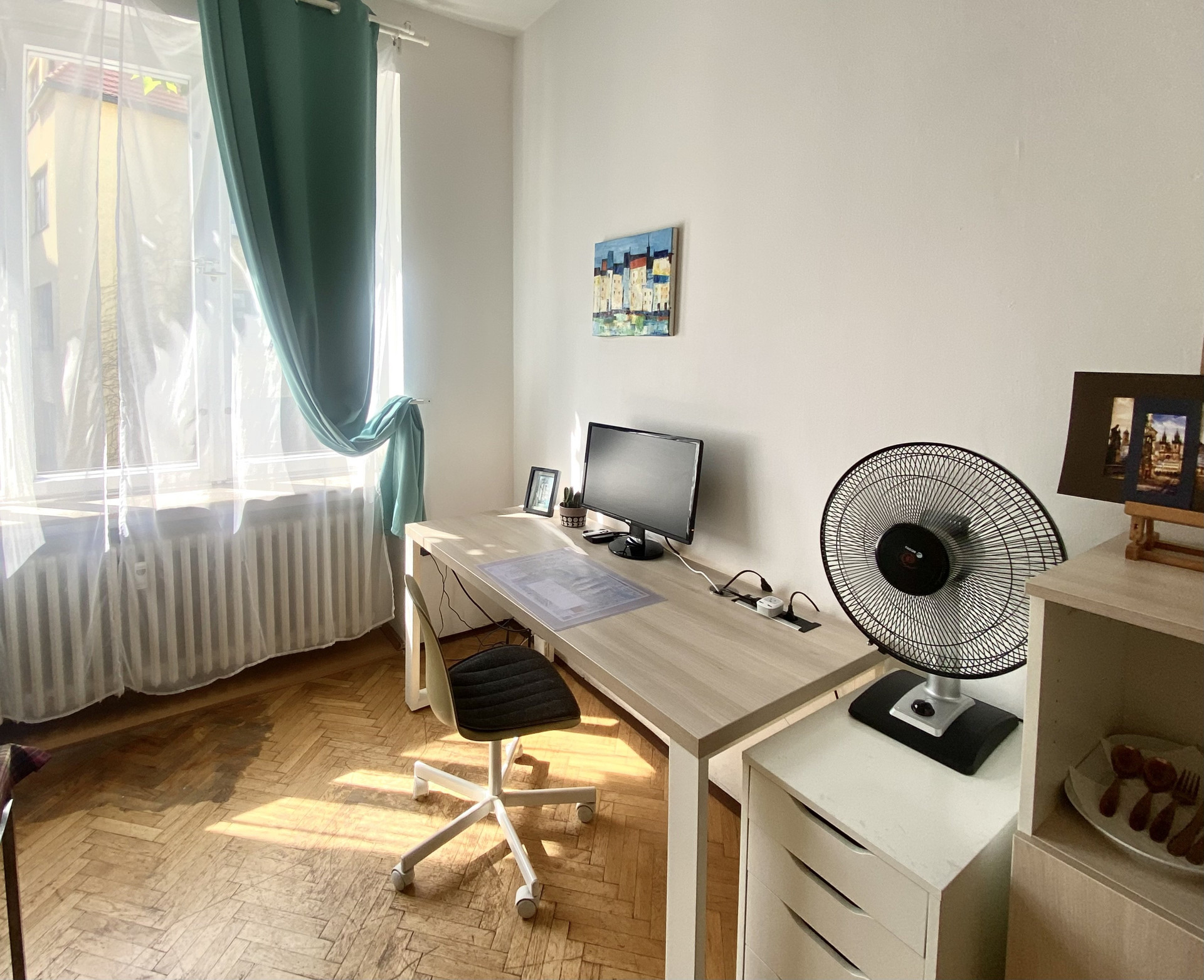 Desk workspace by sunny window
