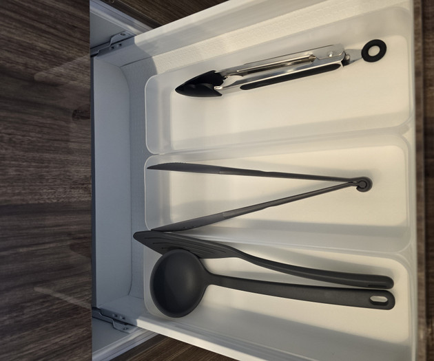 Drawer with kitchen tools