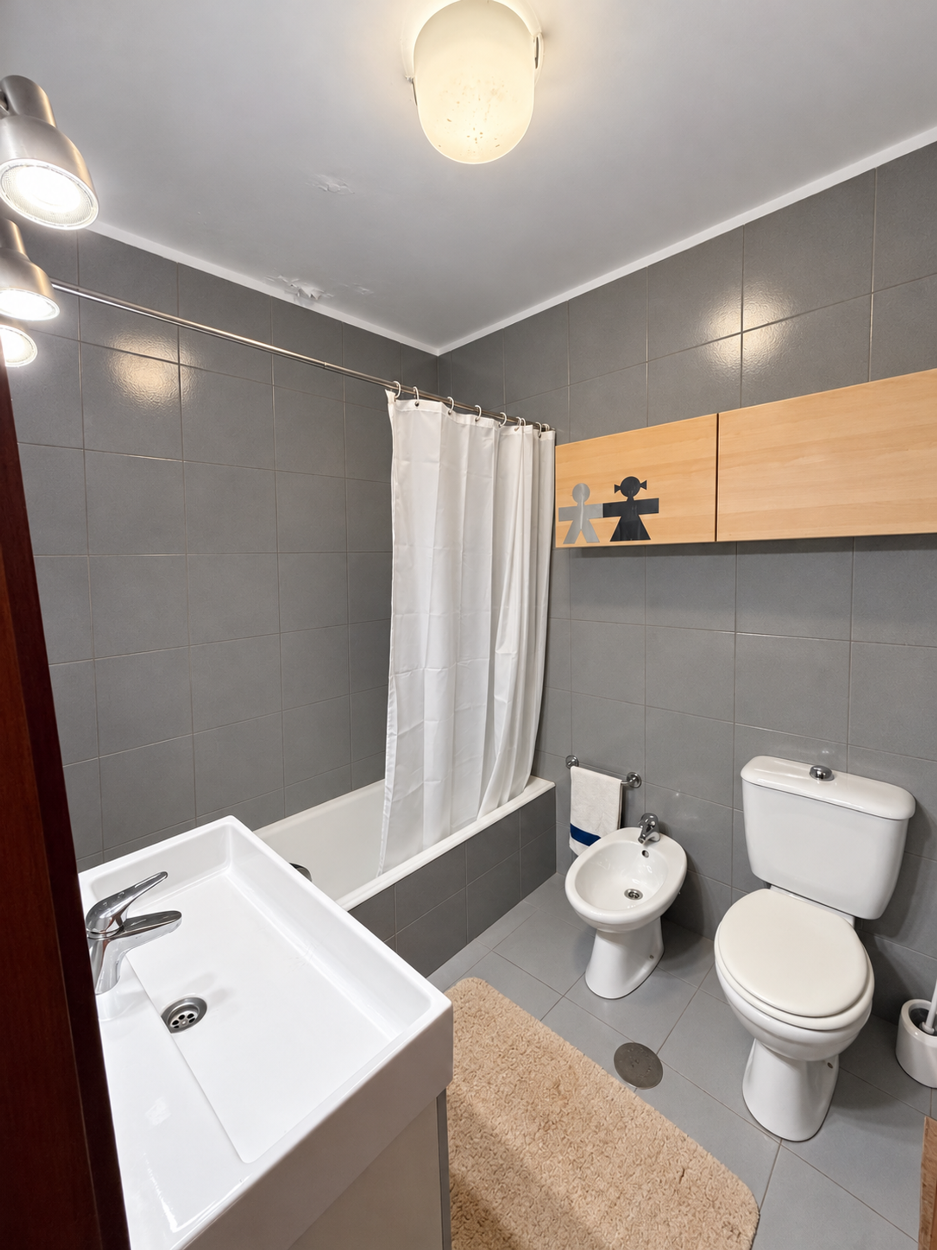 Bathroom with bathtub and bidet