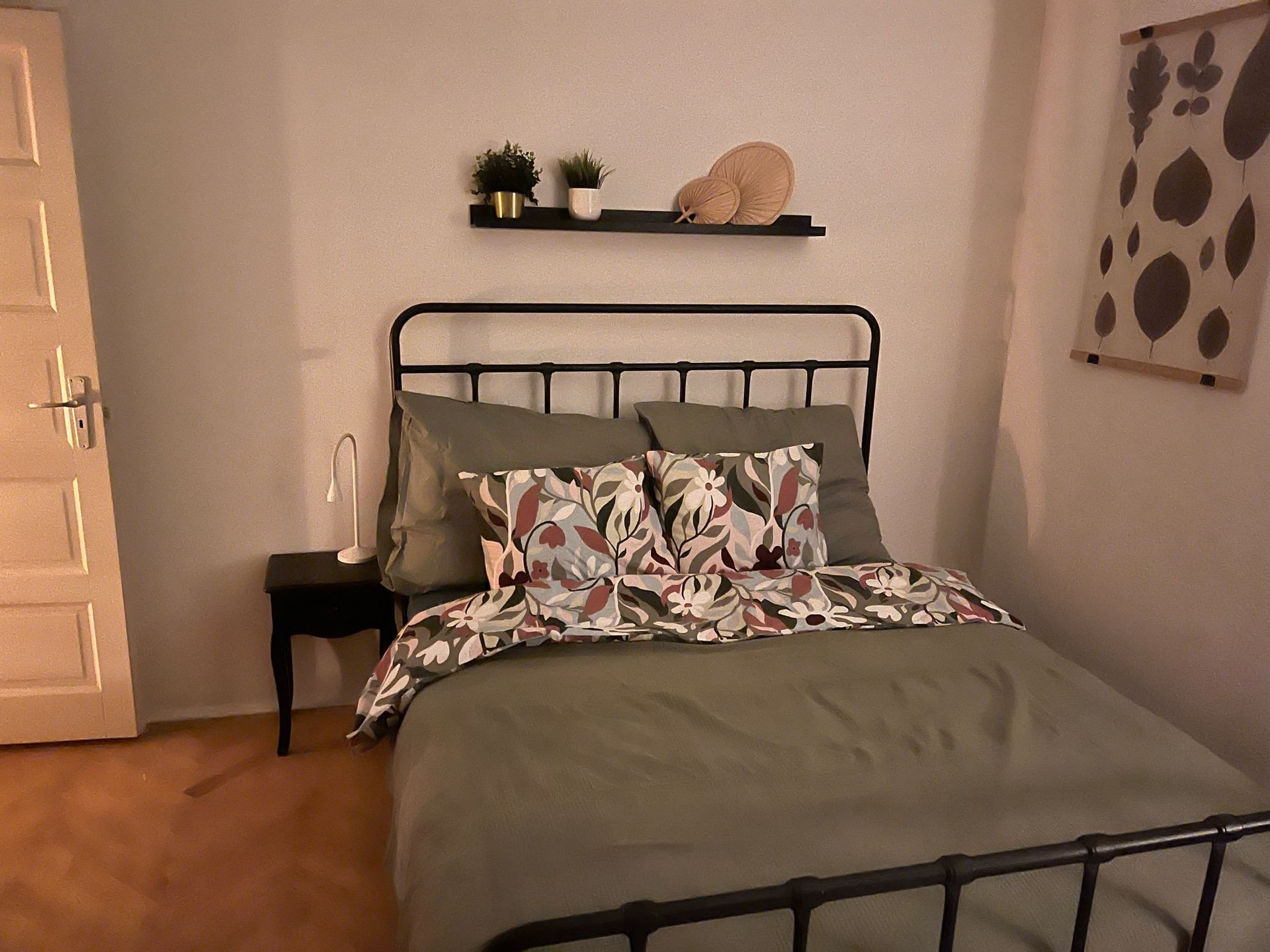 Double bed with floral bedding
