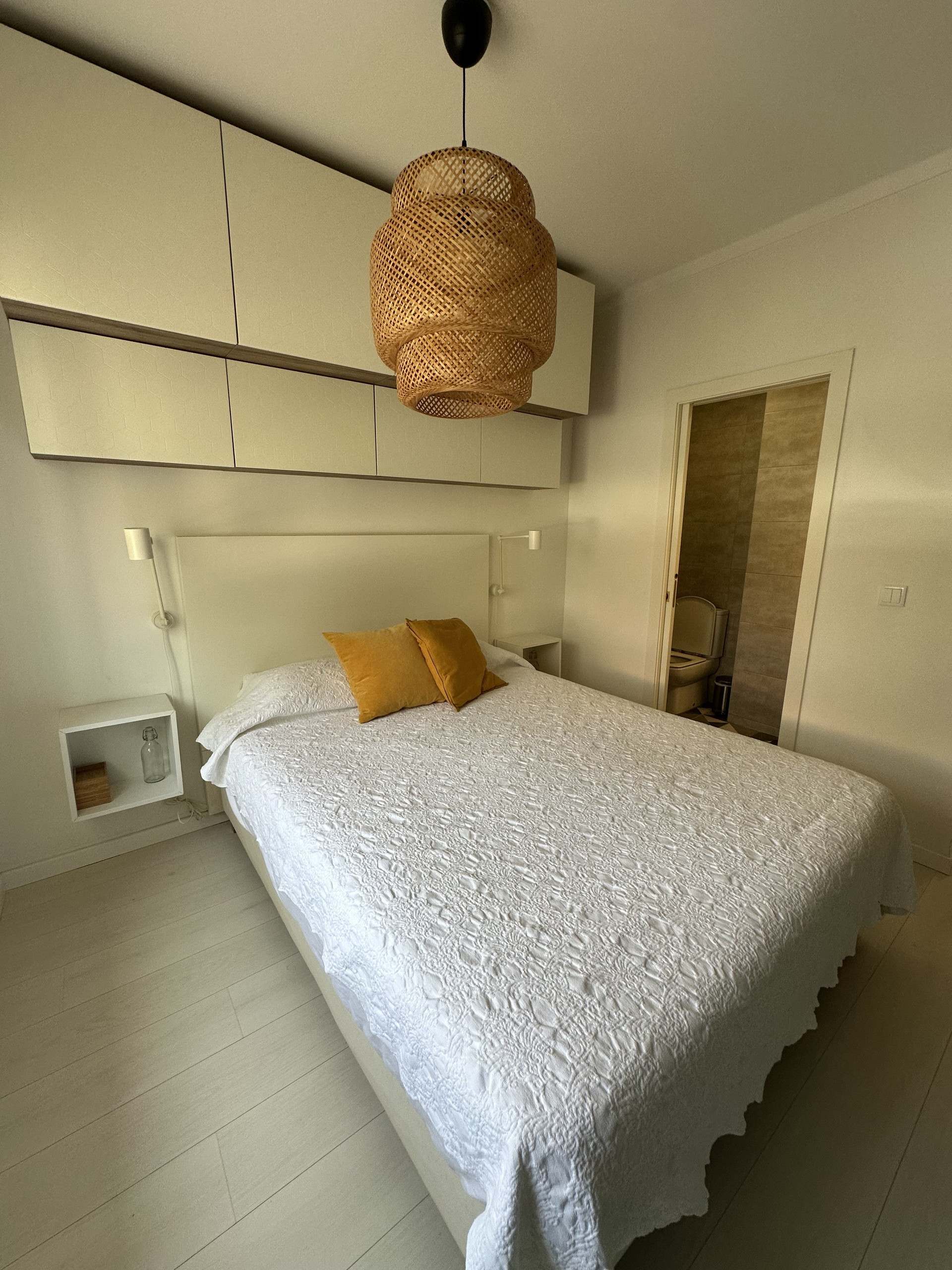 Double bedroom with white bedspread