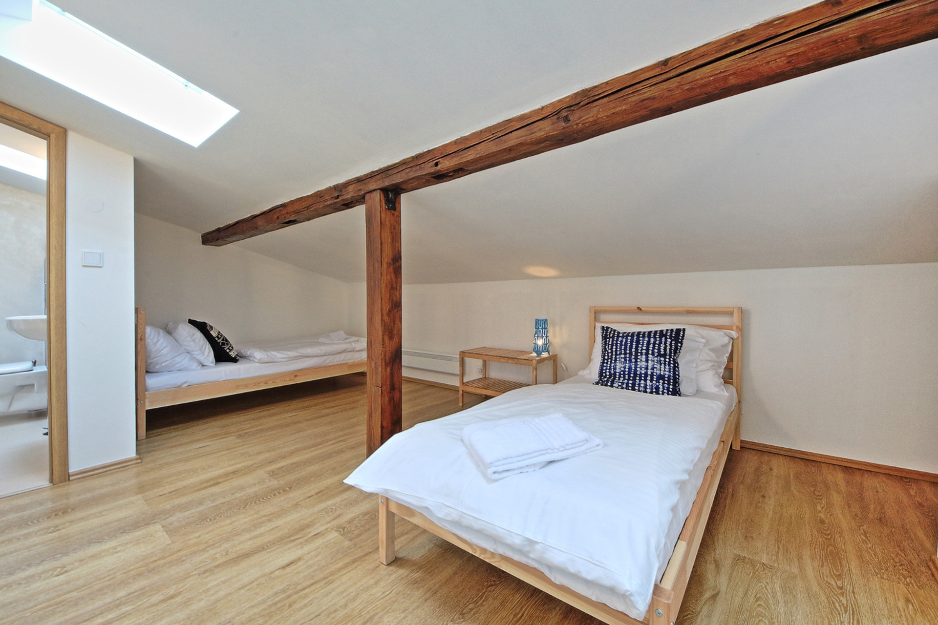 2nd attic bedroom with 2x single beds and 2nd bathroom