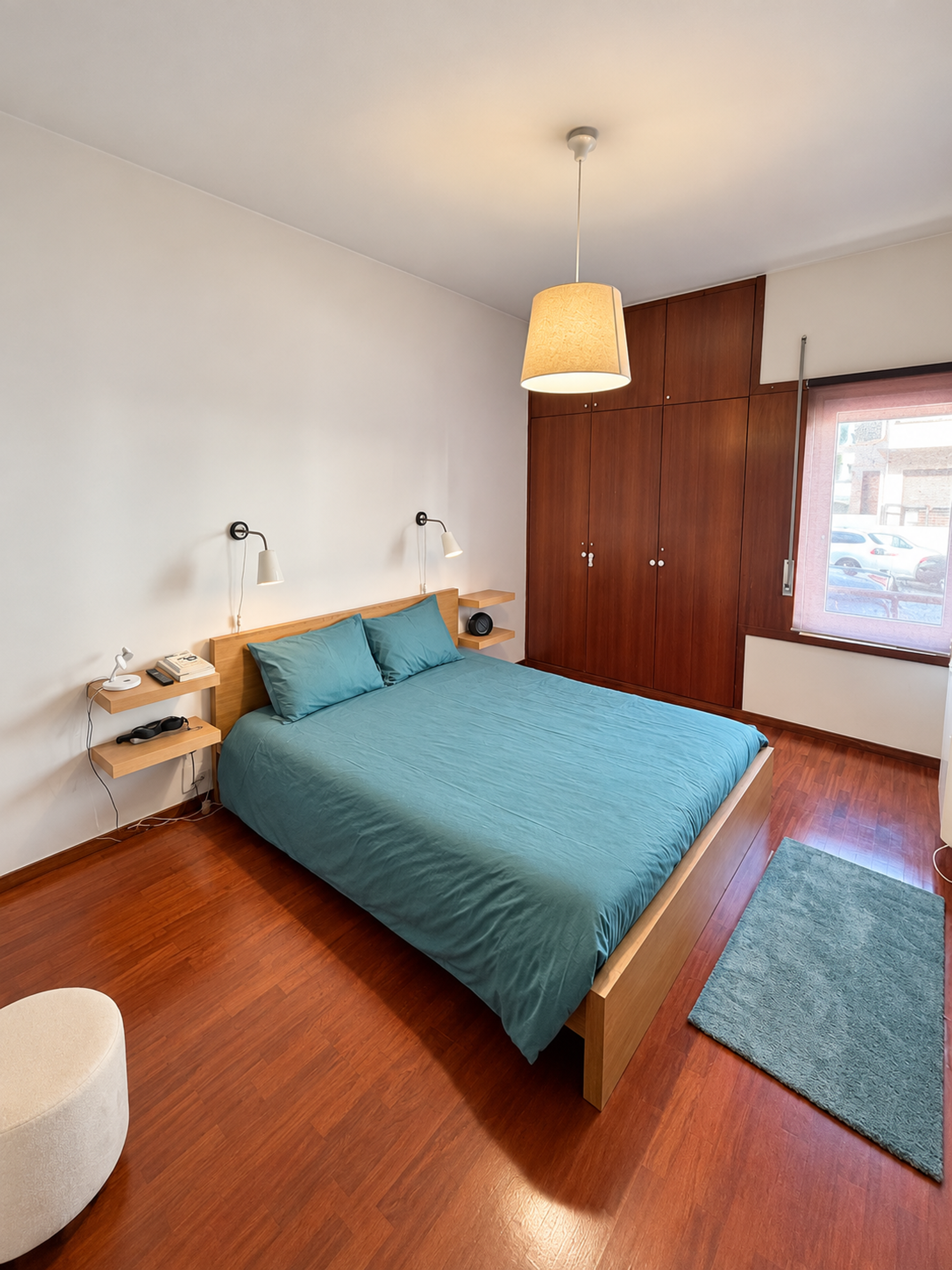 Bedroom with double bed and wardrobe