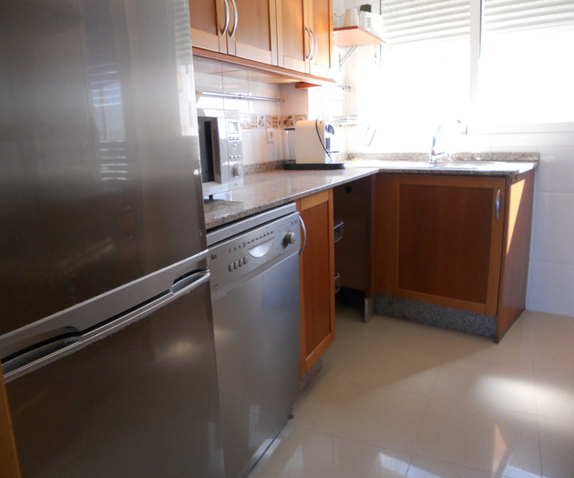 Kitchen with fridge dishwasher