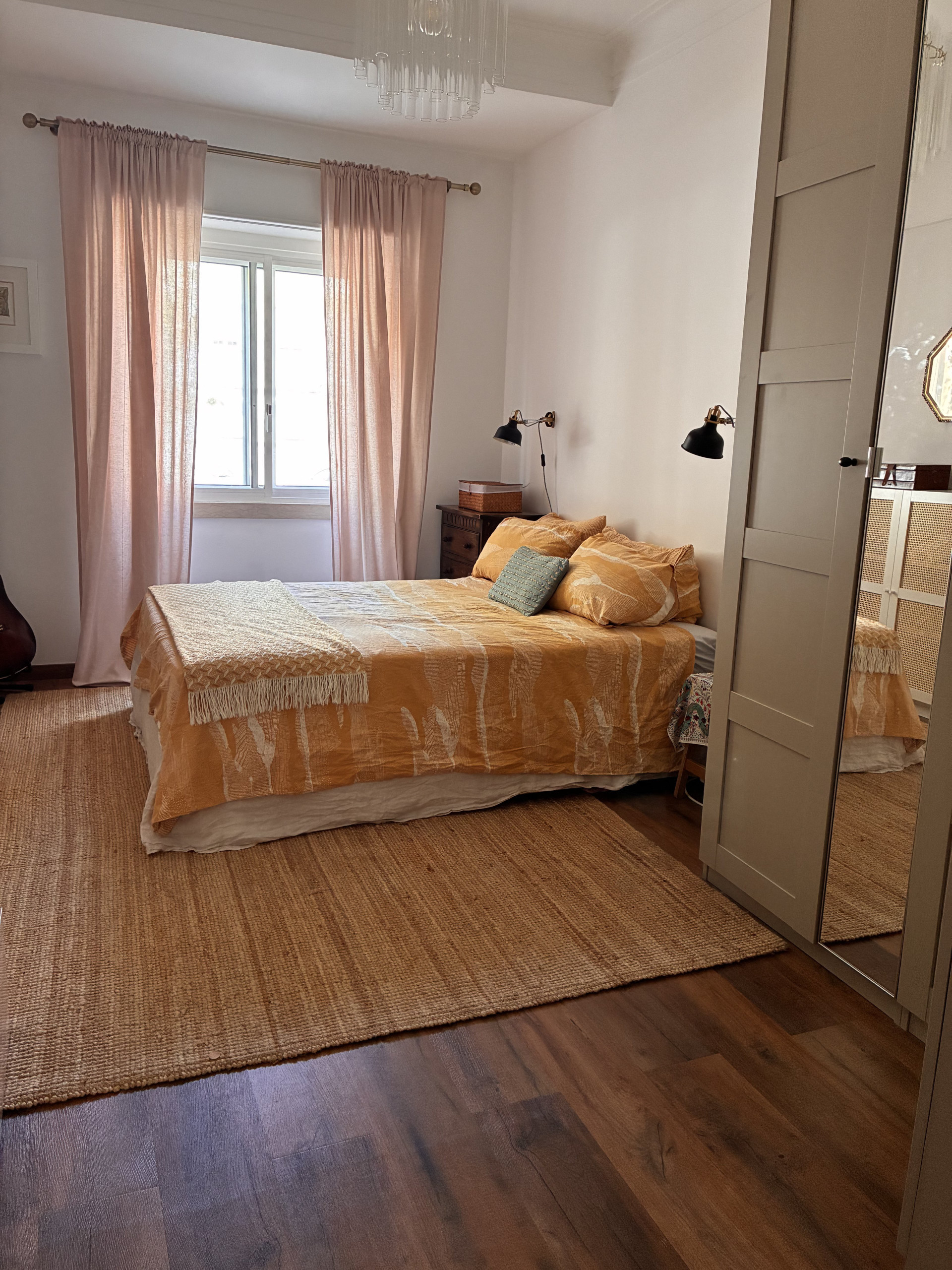 Bright master bedroom with wardrobe