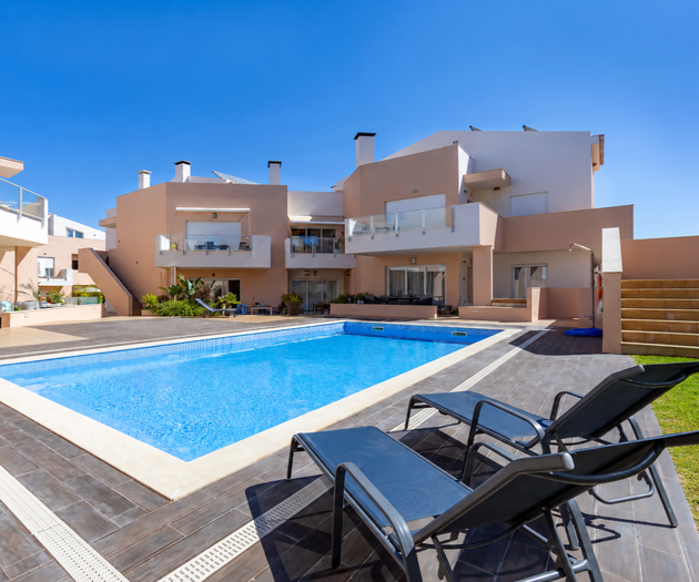 Pool with sun loungers