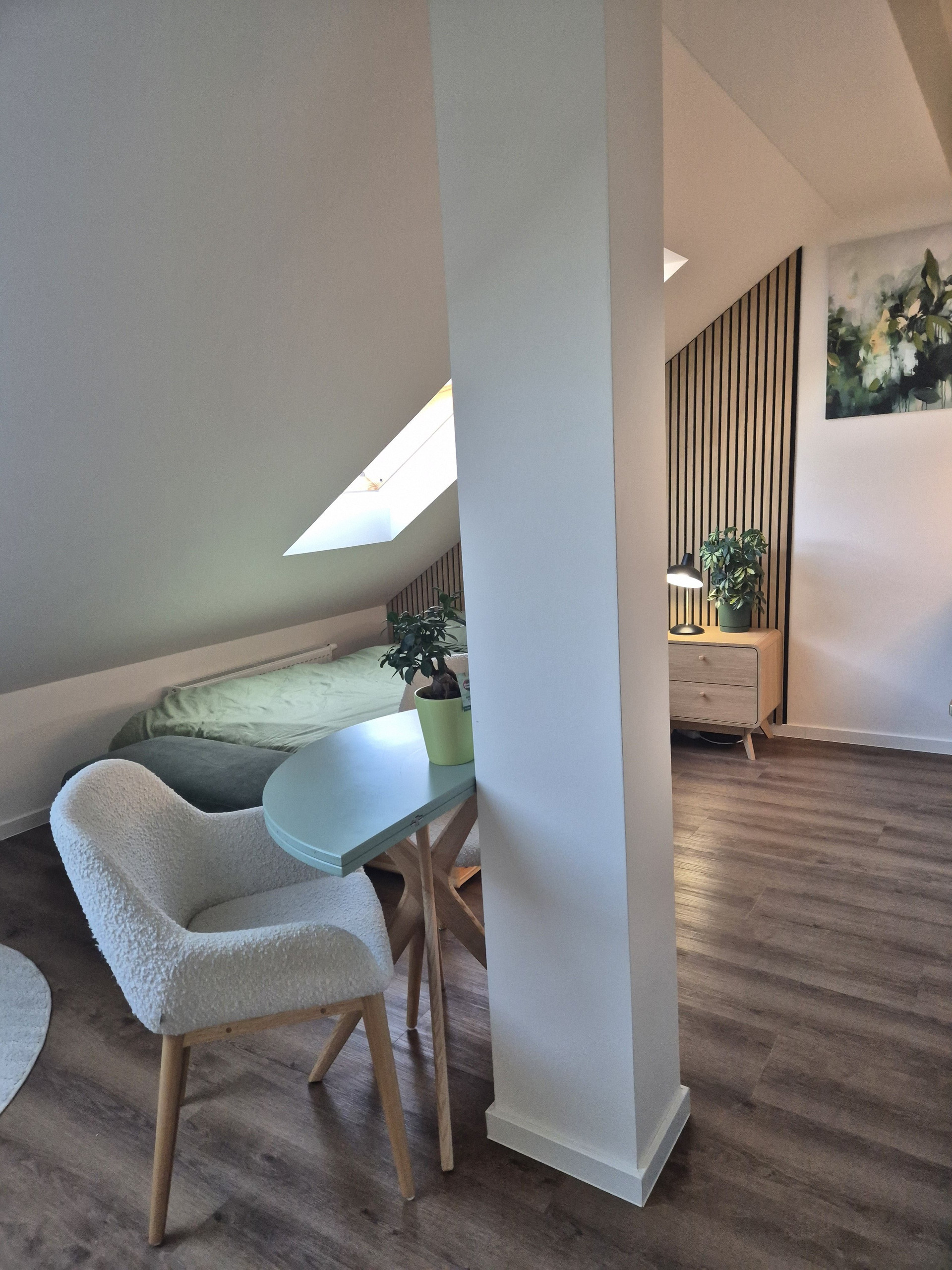 Attic living area with skylight