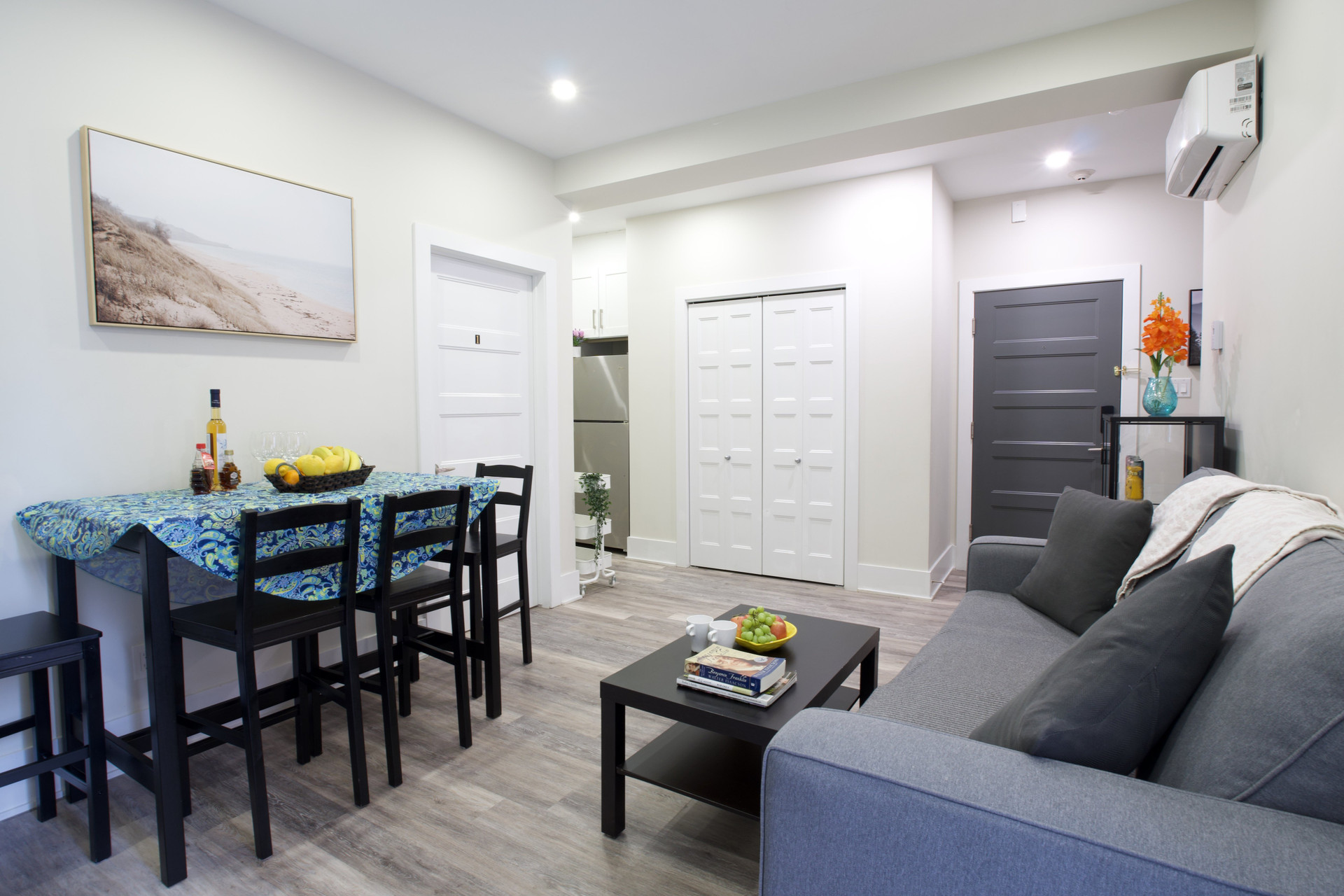 Open living area with kitchen glimpse
