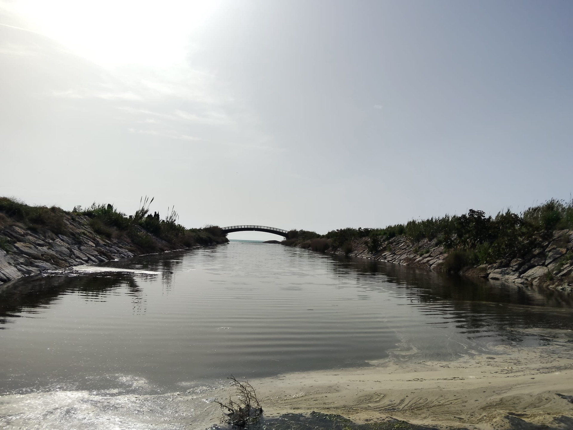 Scenic canal with arched bridge