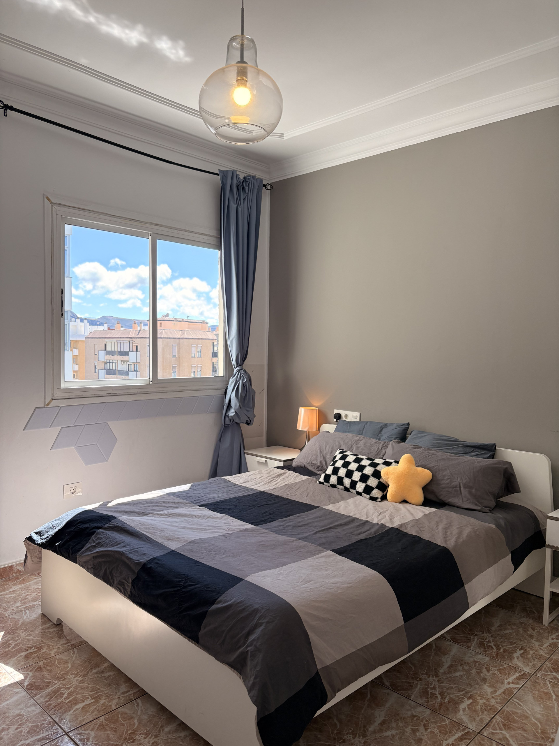 Bright bedroom double bed window
