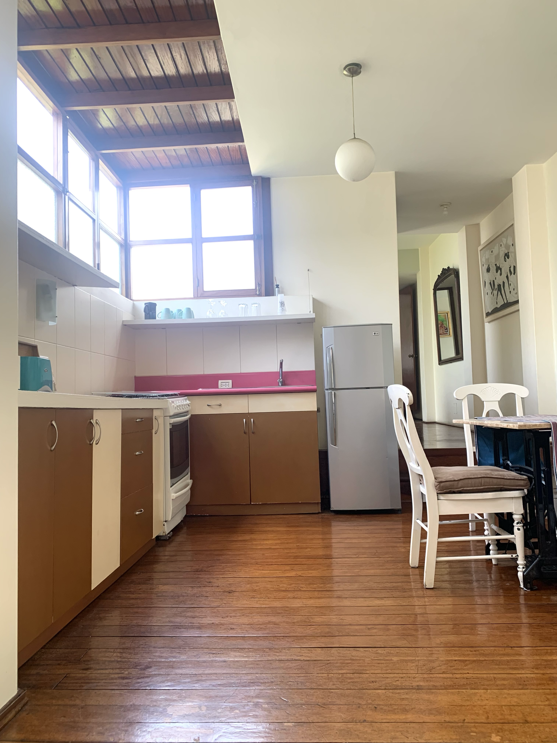 Kitchen with wood floors dining