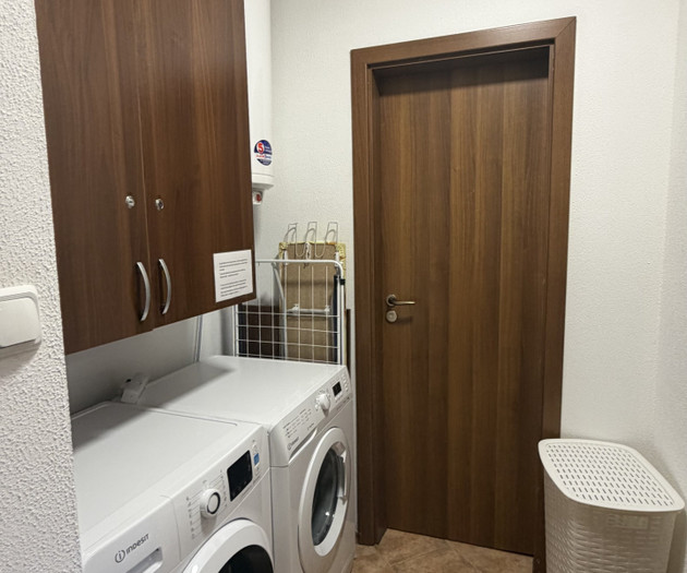 Laundry room with washer and dryer