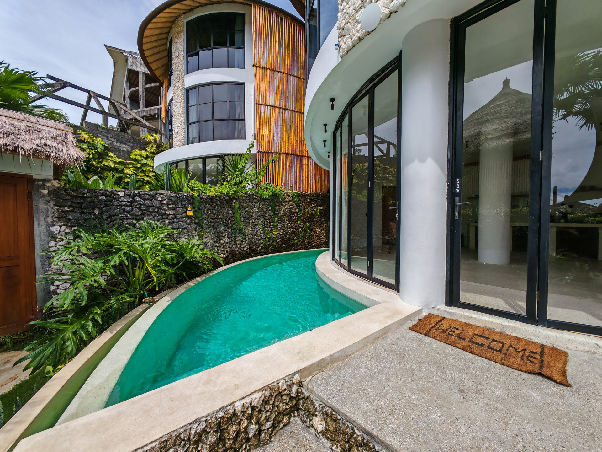 Private pool with villa entrance
