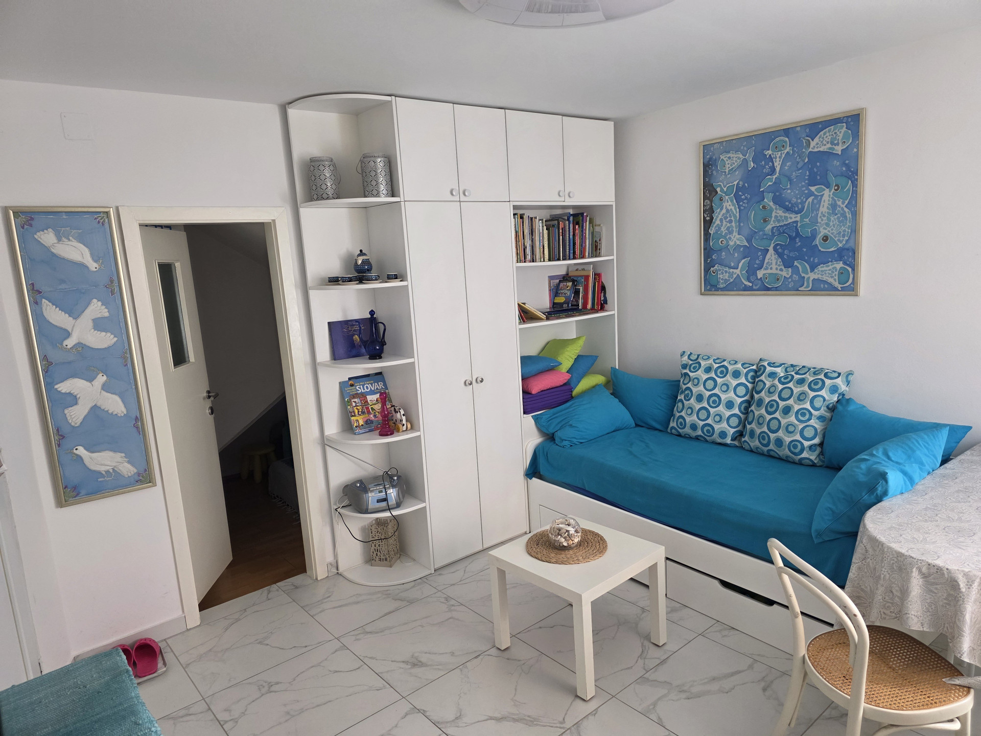 Living room with blue sofa bed