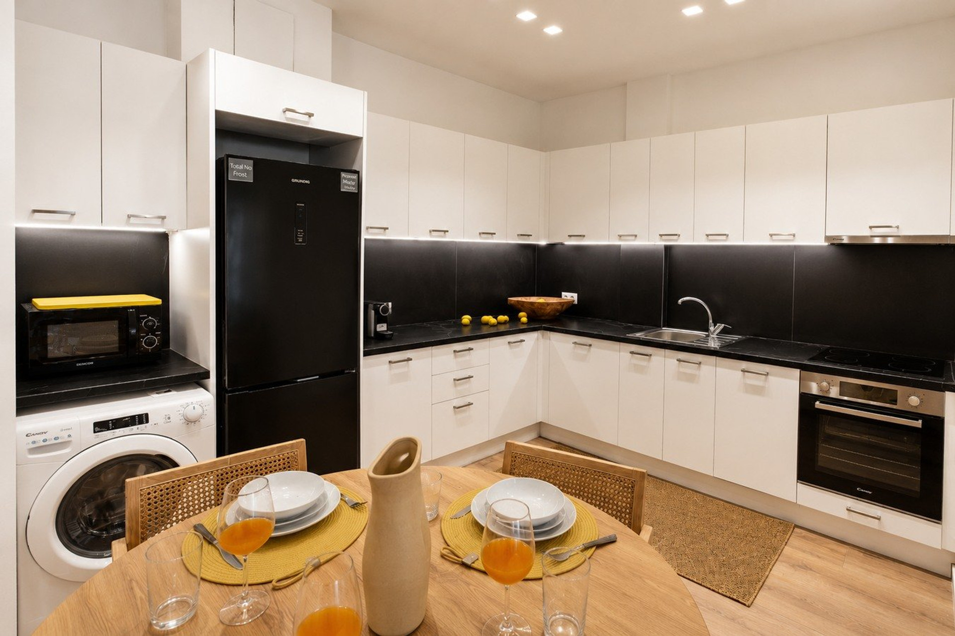 Kitchen with dining table and appliances