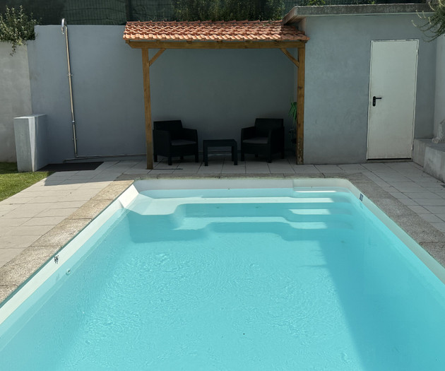 Pool with lounge pergola seating
