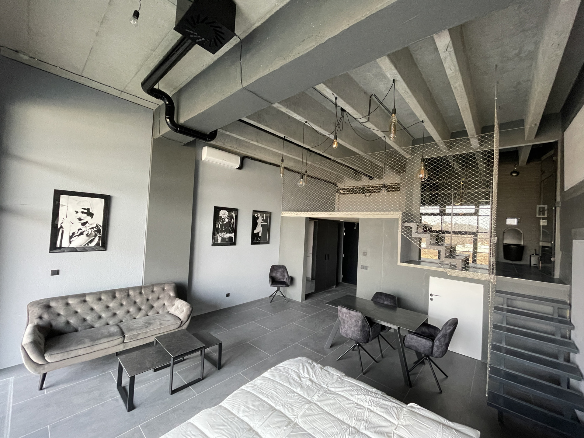 combined living, dining, bedroom