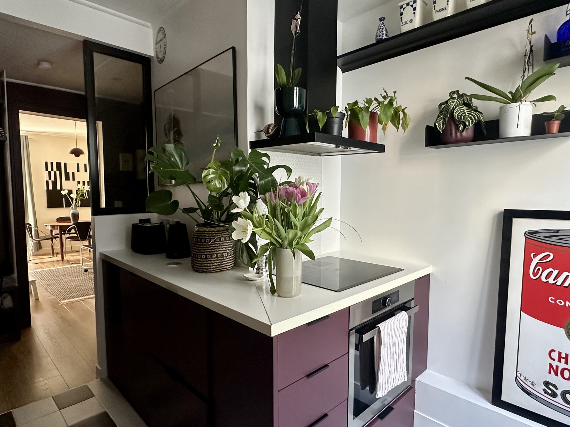 Compact kitchen with purple cabinets