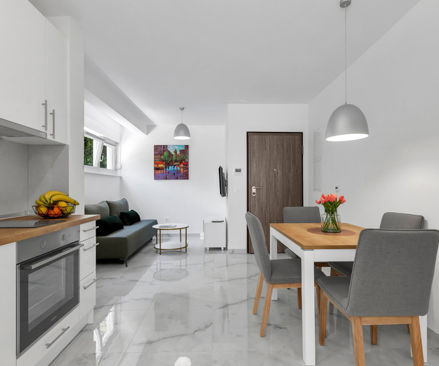 Kitchen, living, and dining space
