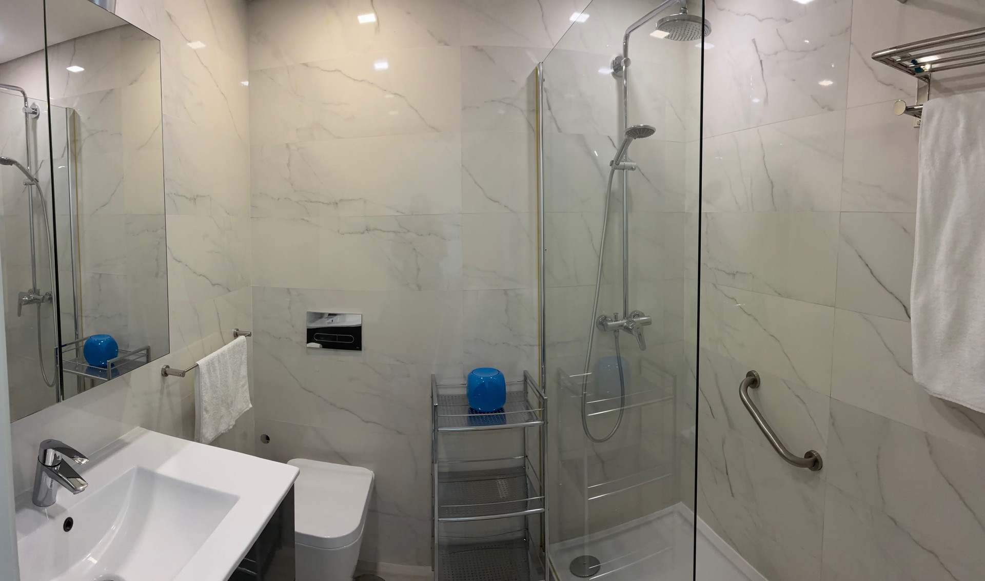 Marble bathroom with glass shower