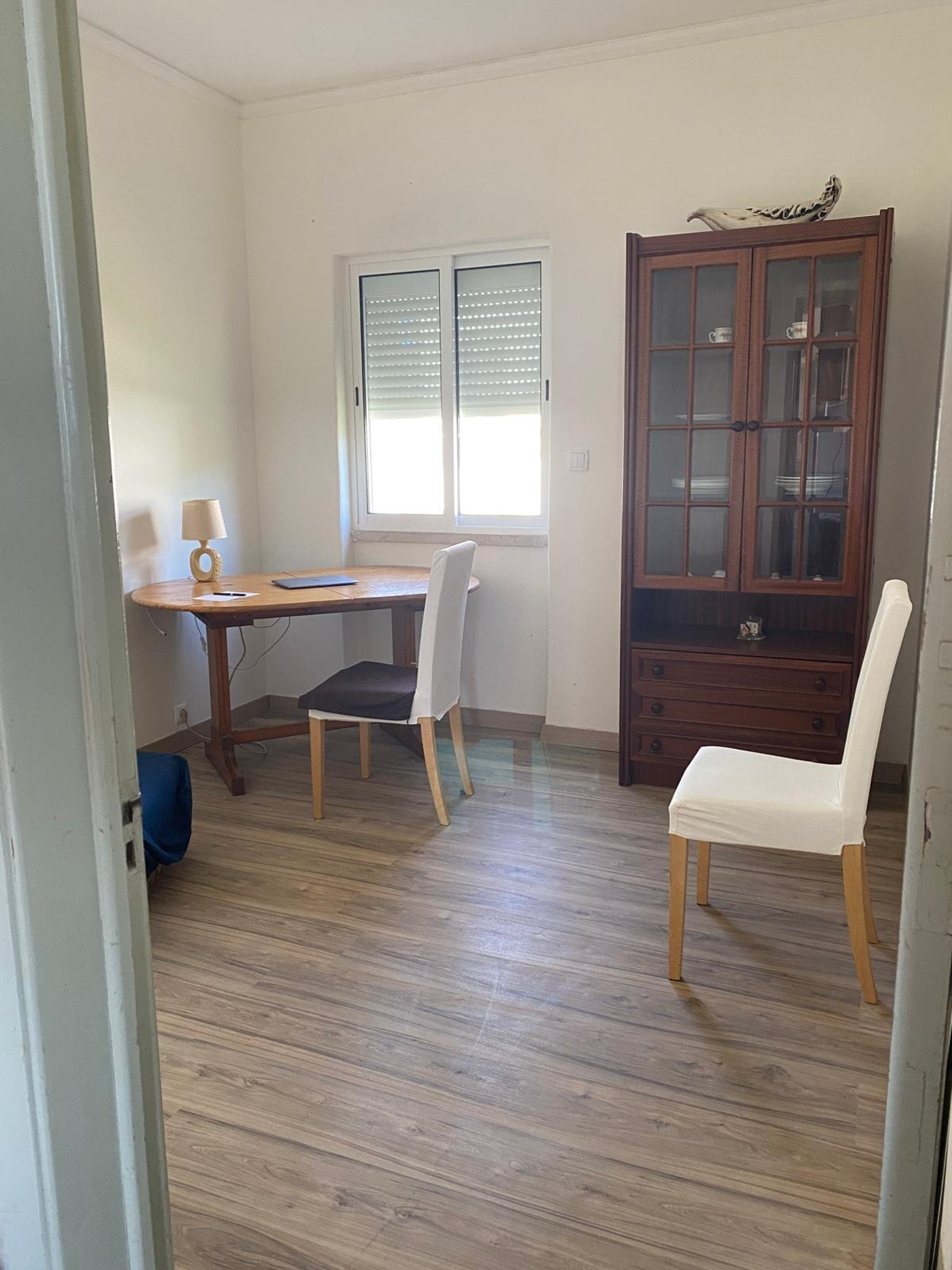 Bright room with desk and cabinet