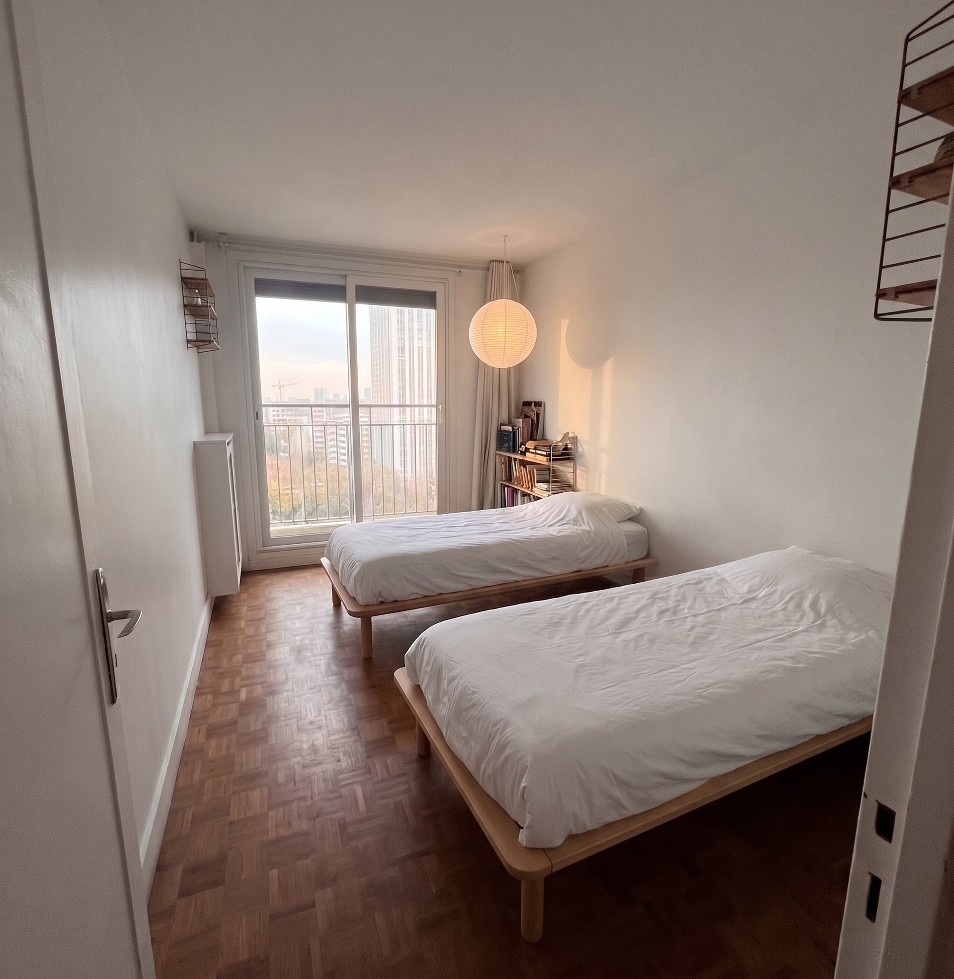 Twin bedroom with balcony door