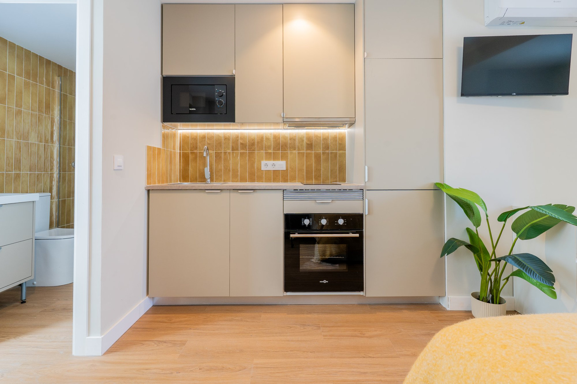 Compact kitchen with oven microwave