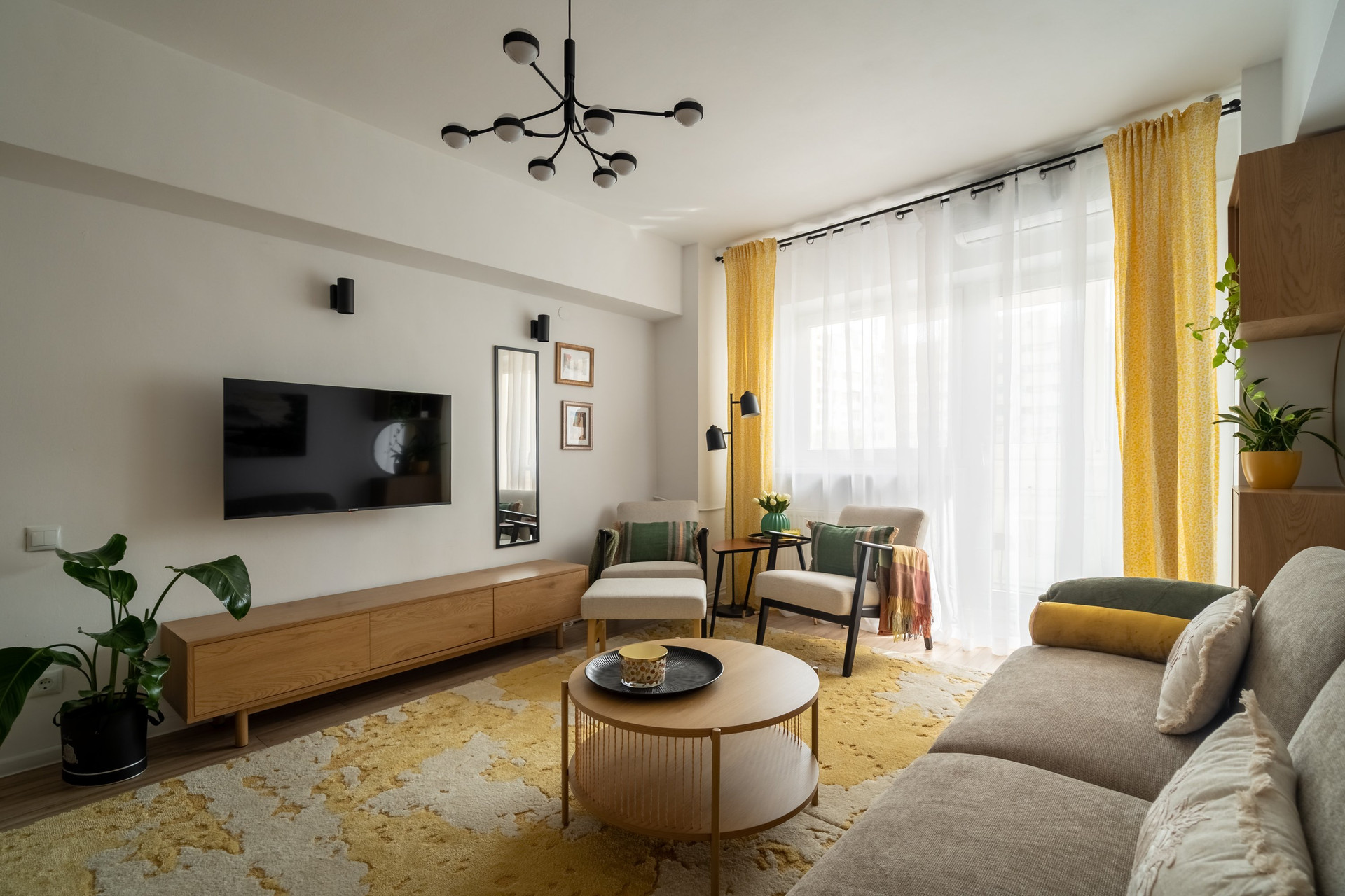 Bright living room with yellow curtains