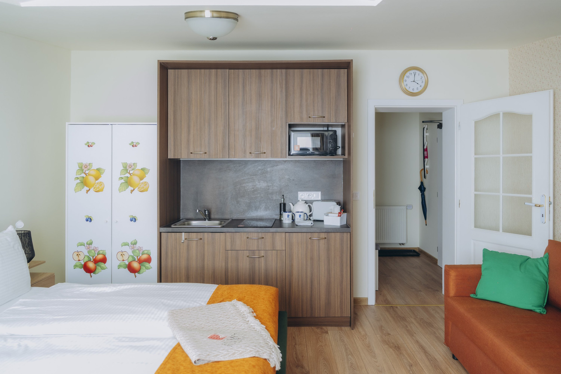 Kitchenette with fridge and hallway