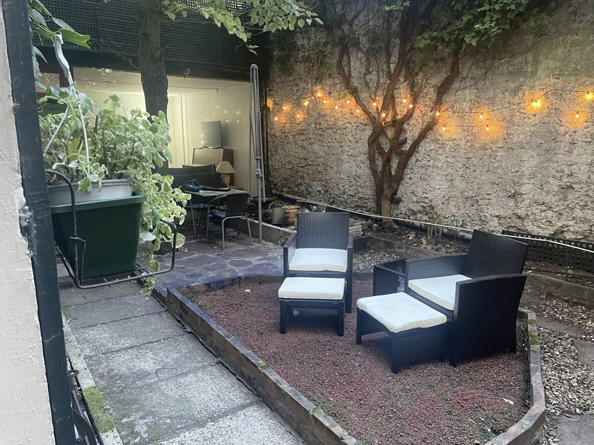 Private garden patio with seating