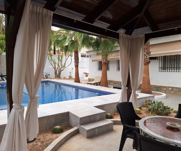 Gazebo overlooking pool and patio