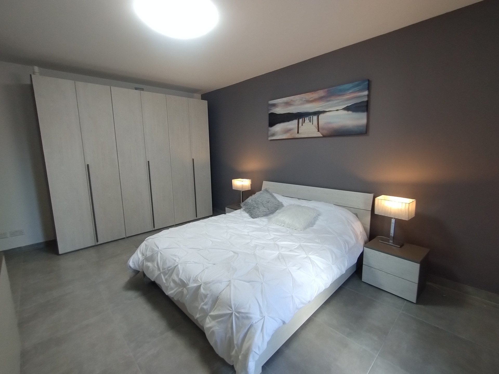 Bedroom with wardrobe and double bed