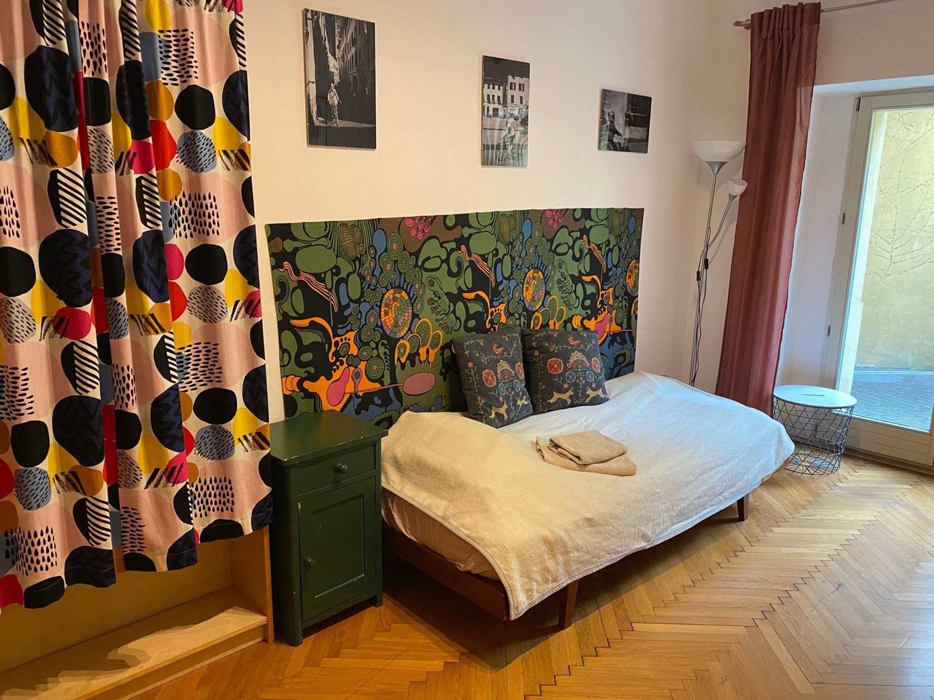 Bed with colorful headboard design