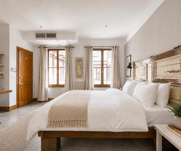 Bedroom with rustic wood headboard