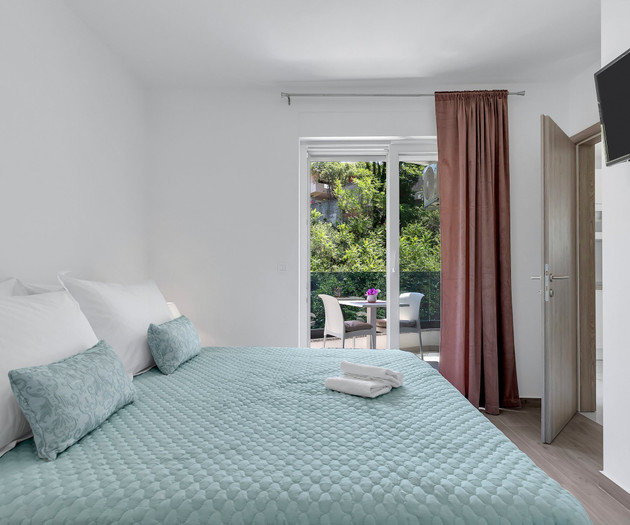 Bedroom with mountain view balcony