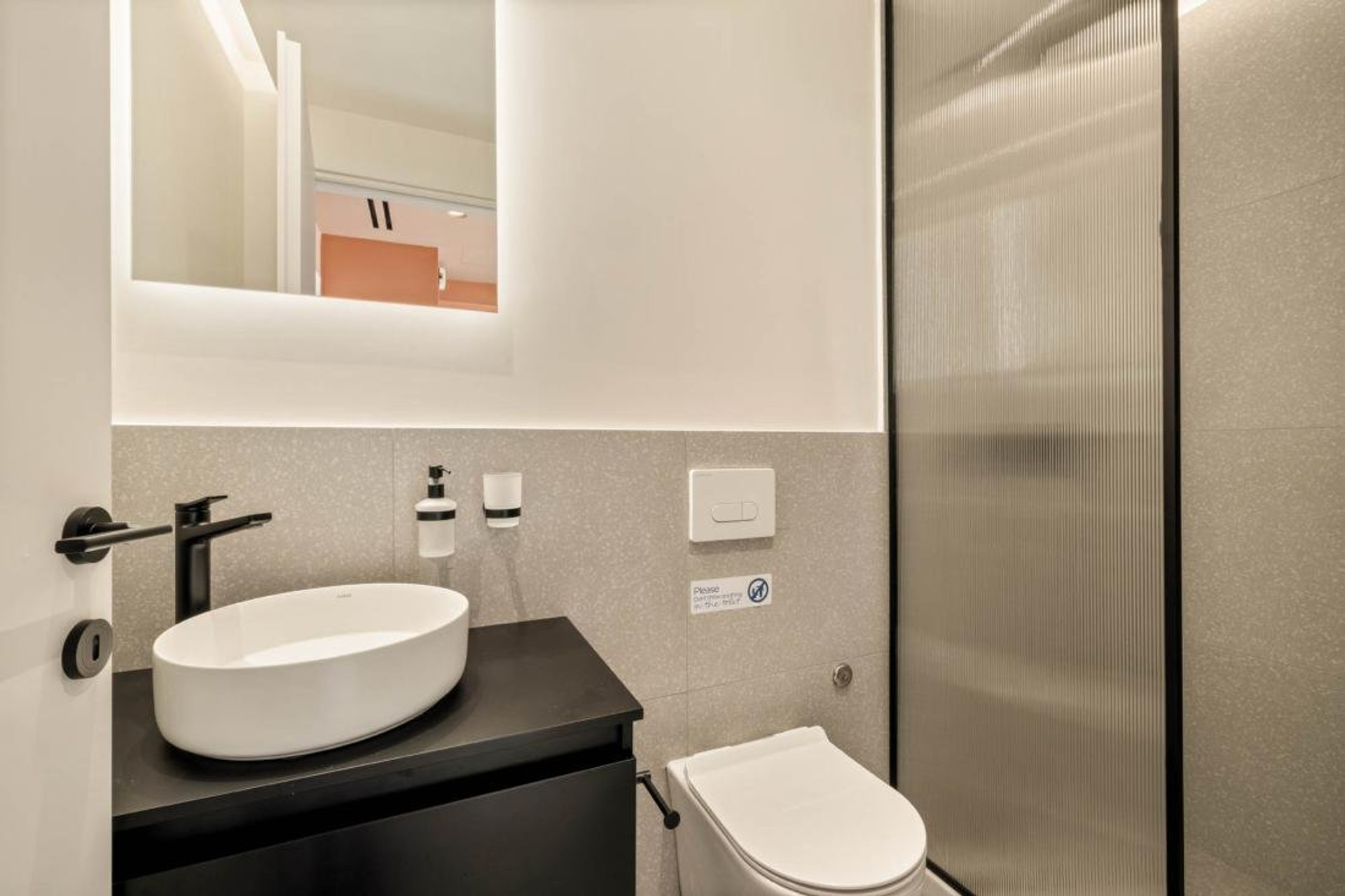 Modern bathroom with black fixtures