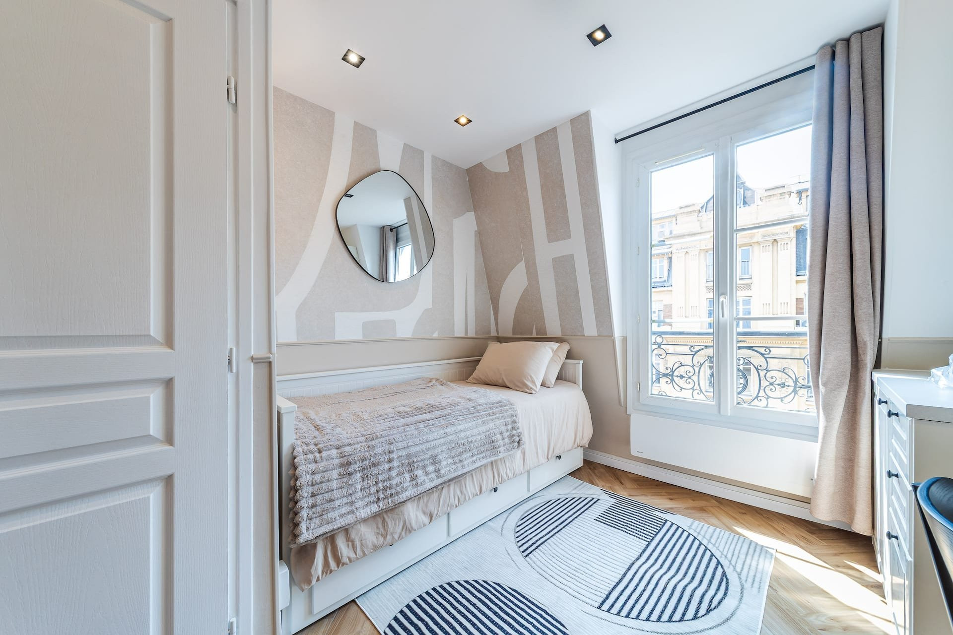 Cozy single bed by window
