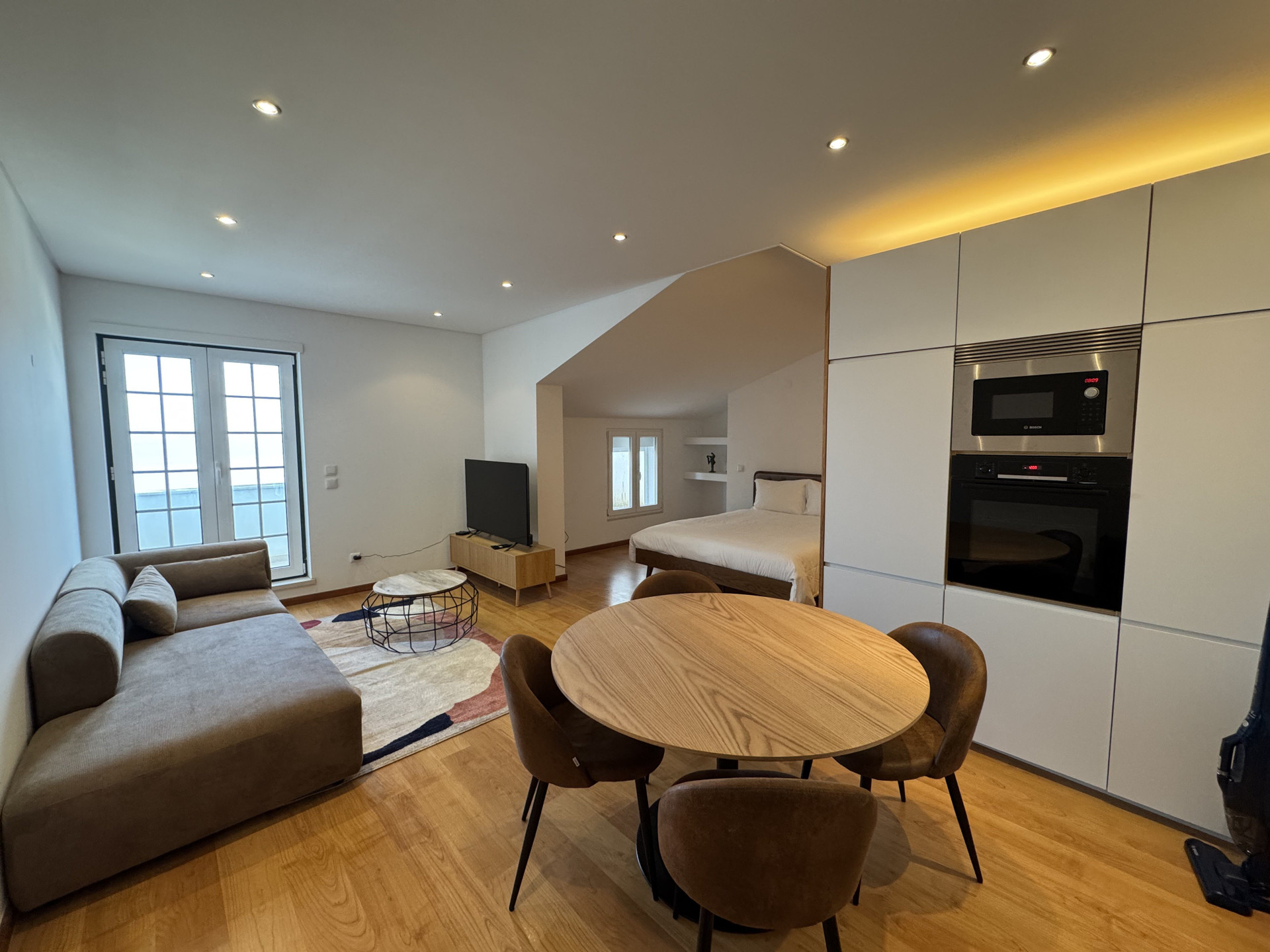 Living area with dining and kitchen