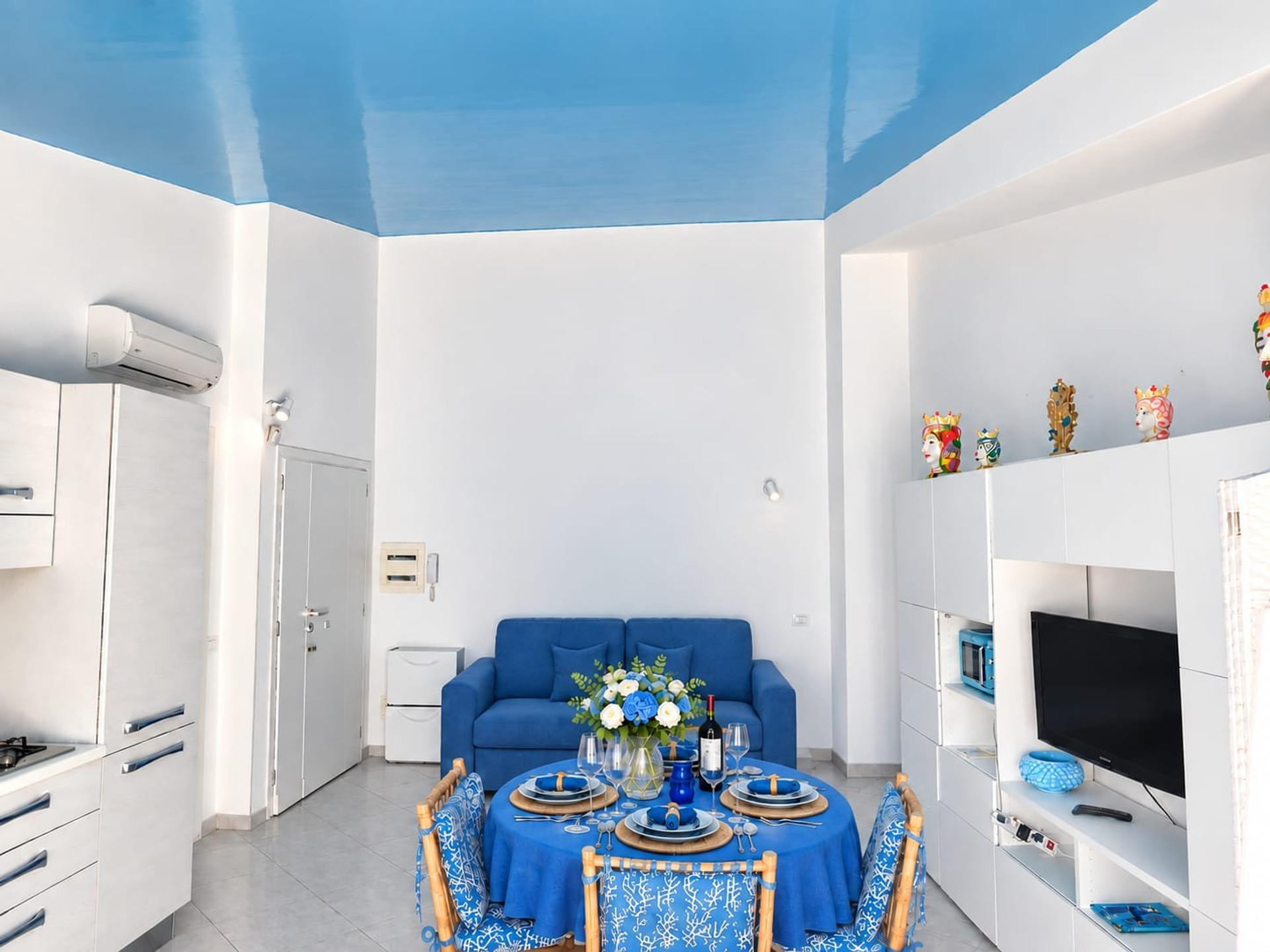 Living room with blue sofa